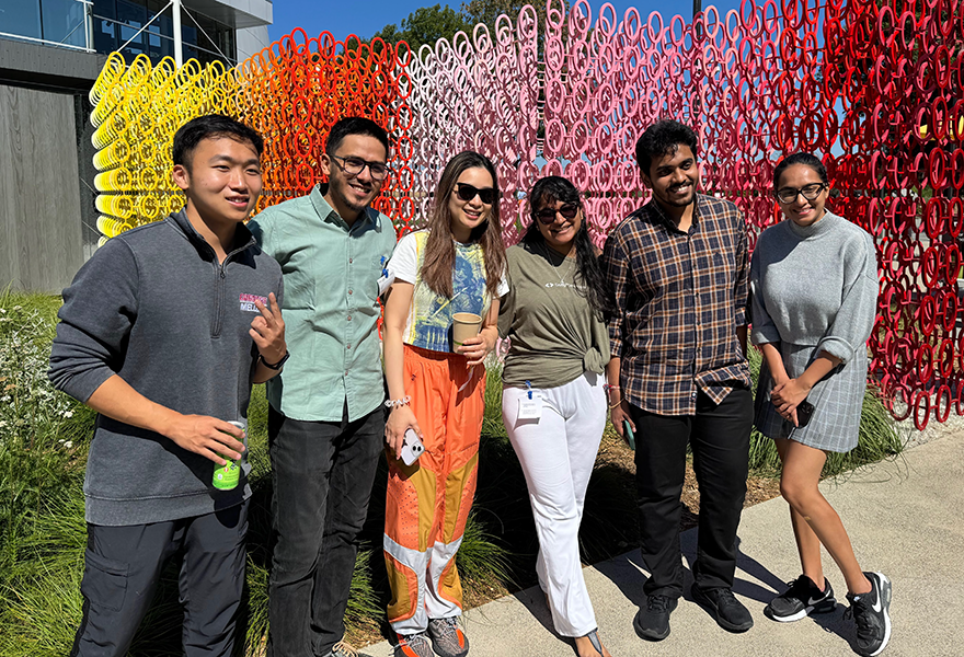students pose for photo