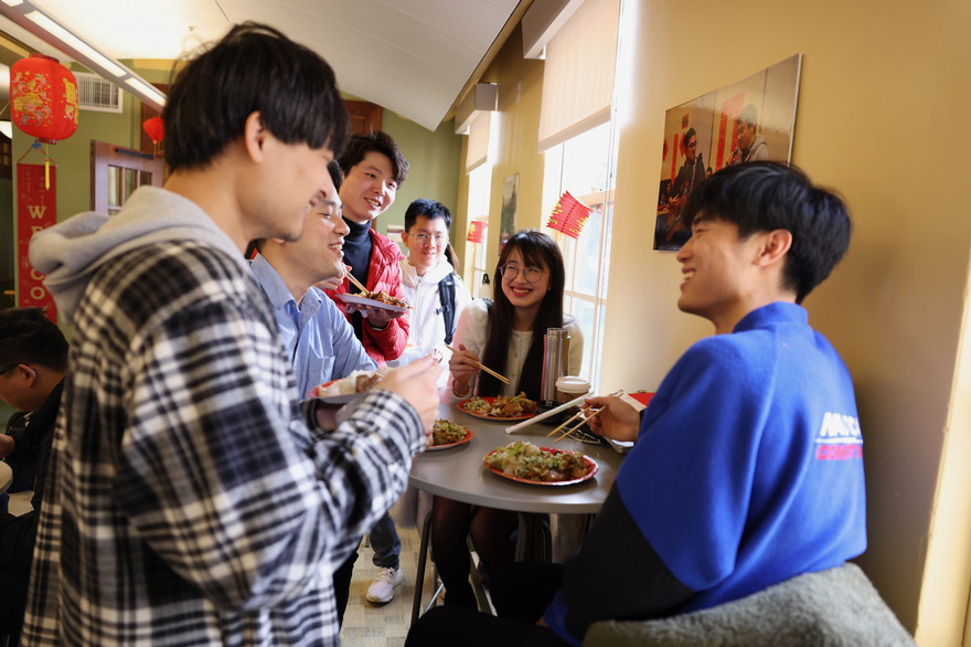 students gather at social event