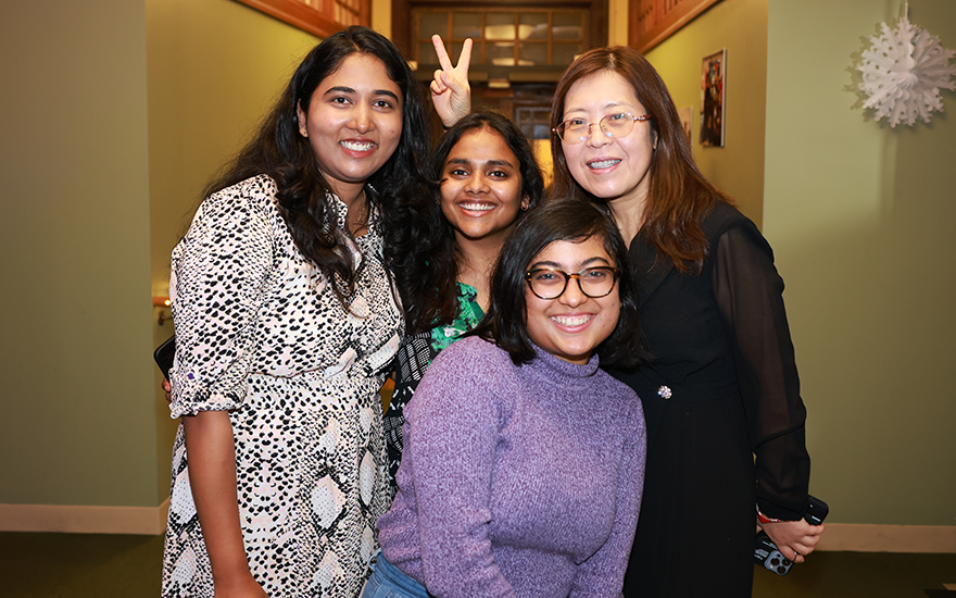 international students pose for photo